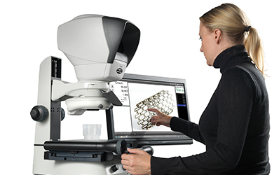 woman using Swift PRO measuring system to inspect stent